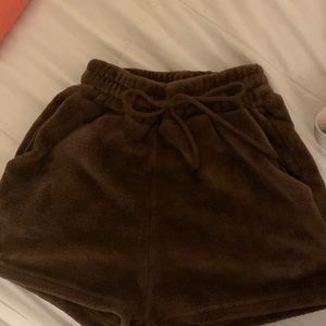 Brown fluffy shorts, very snag and cute. Can fit a small to medium ♥️